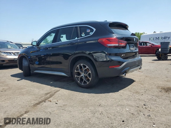 2021 BMW X1 xDrive28i with VIN WBXJG9C06M5S33201, listed as a Copart auction lot 66391015 with 53,395 mi miles and Salvage title. Bid and sale history available at DreamBid. Image 2.