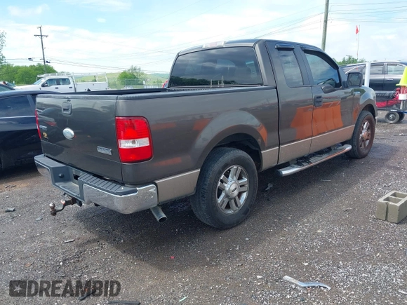 2006 Ford F-150 STX with VIN 1FTRX12W26FA38619, listed as a IAAI auction lot 42124497 with 215,306 mi miles. Bid and sale history available at carsss.com. Image 4.