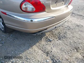 2004 Jaguar X-Type z VIN SAJEA51C84WD82052, wystawiony jako IAAI lot #42240141 z przebiegiem 50 631 mil mil oraz . Historia ofert i sprzedaży dostępna na DreamBid. Obrazek 6.