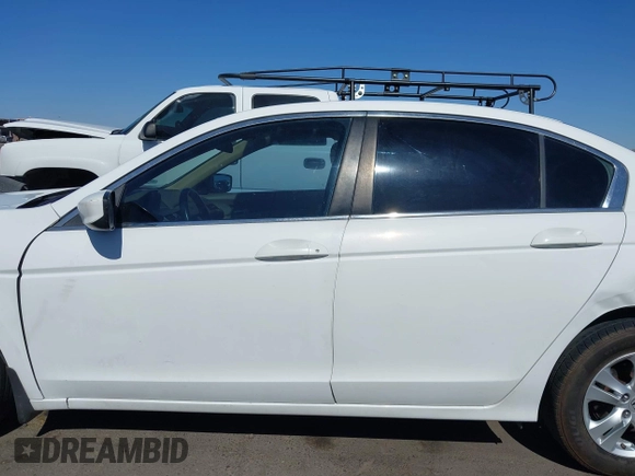 2009 Honda Accord LX-P with VIN 1HGCP26469A157796, listed as a IAAI auction lot 42270687 with 180,061 mi miles and . Bid and sale history available at DreamBid. Image 14.