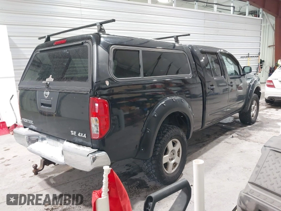 2007 Nissan Frontier SE with VIN 1N6AD09W17C447779, listed as a IAAI auction lot 41362259 with 142,153 mi miles. Bid and sale history available at carsss.com. Image 4.