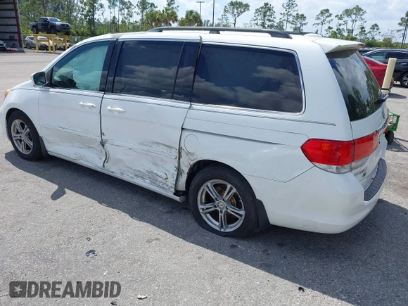 2008 Honda Odyssey Touring with VIN 5FNRL38858B006304, listed as a IAAI auction lot 41814309 with 208,778 mi miles. Bid and sale history available at carsss.com. Image 3.