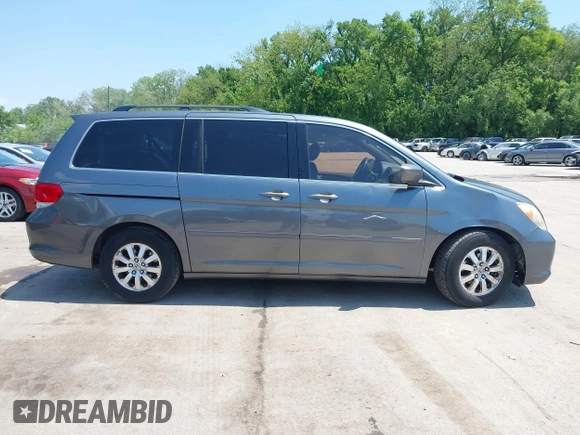 2010 Honda Odyssey EX-L z VIN 5FNRL3H76AB071871, wystawiony jako IAAI lot #42214867 z przebiegiem 255 116 mil mil oraz . Historia ofert i sprzedaży dostępna na DreamBid. Obrazek 13.
