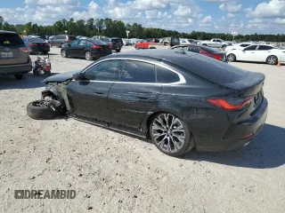 2024 BMW 4 Series 430i with VIN WBA63AV06RFR10405, listed as a Copart auction lot 74097404 with Not Provided miles and Salvage Title. Bid and sale history available at DreamBid. Image 2.