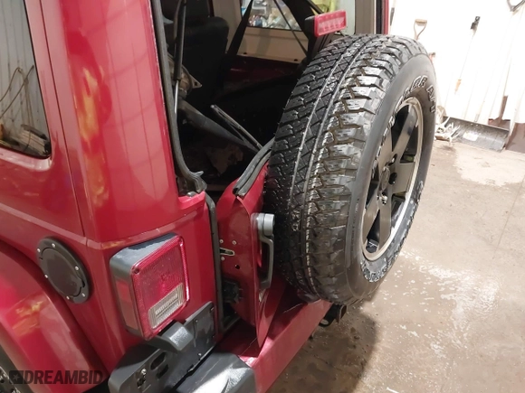 2012 Jeep Wrangler Unlimited Sahara with VIN 1C4BJWEG0CL256852, listed as a IAAI auction lot 41765640 with 171,408 mi miles. Bid and sale history available at carsss.com. Image 18.