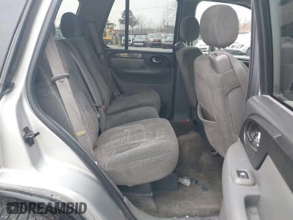 2004 GMC Envoy SLE with VIN 1GKDT13SX42135951, listed as a IAAI auction lot 41668252 with 216,193 mi miles. Bid and sale history available at carsss.com. Image 8.