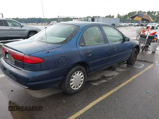1998 Ford Contour with VIN 3FAFP663XWM122628, listed as a IAAI auction lot 42692574 with 227,055 mi miles and . Bid and sale history available at DreamBid. Image 4.