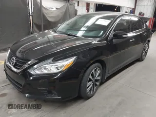2017 Nissan Altima SV with VIN 1N4AL3AP8HC297267, listed as a IAAI auction lot 41557027 with 89,831 mi miles and . Bid and sale history available at carsss.com. Image 2.