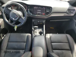 2025 Dodge Durango GT Plus with VIN 1C4RDJDG7SC503972, listed as a Copart auction lot 56074765 with 7,104 mi miles and Salvage title. Bid and sale history available at DreamBid. Image 8.