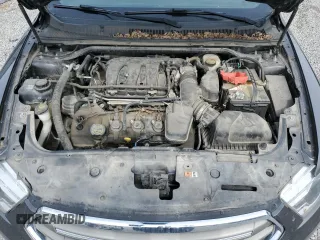 2015 Ford Taurus SEL z VIN 1FAHP2E89FG177287, wystawiony jako Copart lot #56074615 z przebiegiem 196 421 mil mil oraz Szkoda całkowita • Salvage title. Historia ofert i sprzedaży dostępna na DreamBid. Obrazek 11.