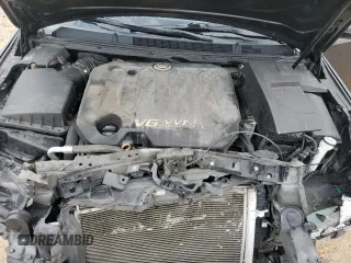 2013 Cadillac XTS Luxury z VIN 2G61P5S33D9217027, wystawiony jako Copart lot #56358835 z przebiegiem 82 644 mil mil oraz Szkoda całkowita • Salvage title. Historia ofert i sprzedaży dostępna na DreamBid. Obrazek 11.
