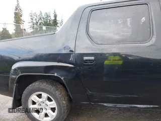 2006 Honda Ridgeline RTL z VIN 2HJYK16596H530876, wystawiony jako IAAI lot #41906807 z przebiegiem Nie podano mil oraz . Historia ofert i sprzedaży dostępna na DreamBid. Obrazek 12.