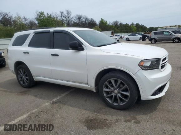 2018 Dodge Durango с VIN NY76958, выставлен на аукционе Copart как лот 55122245 с пробегом 102 413 миль миль и Списание • Salvage title. История ставок и продаж доступна на DreamBid. Изображение 4.