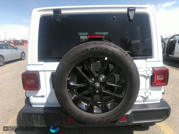2024 Jeep Wrangler 4xe Sahara with VIN 1C4RJXP6XRW292449, listed as a IAAI auction lot 41949234 with 28,680 mi miles. Bid and sale history available at carsss.com. Image 16.