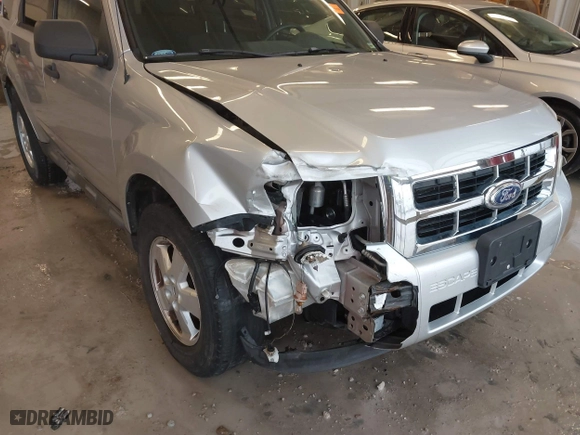 2010 Ford Escape XLT with VIN 1FMCU0D70AKB09942, listed as a IAAI auction lot 41572582 with 218,296 mi miles. Bid and sale history available at carsss.com. Image 6.