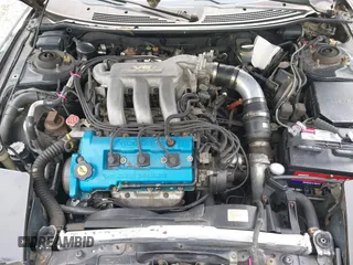 1995 Ford Probe z VIN 1ZVLT22B1S5104093, wystawiony jako IAAI lot #41744654 z przebiegiem 166 253 mil mil oraz . Historia ofert i sprzedaży dostępna na DreamBid. Obrazek 10.