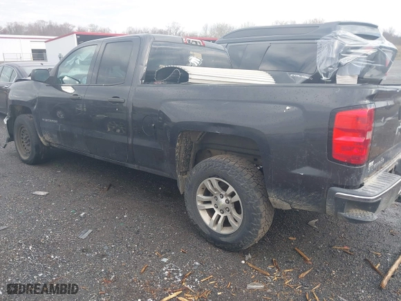 2014 Chevrolet Silverado 1500 LT with VIN 1GCRCRECXEZ297304, listed as a IAAI auction lot 40954344 with 185,323 mi miles. Bid and sale history available at carsss.com. Image 3.