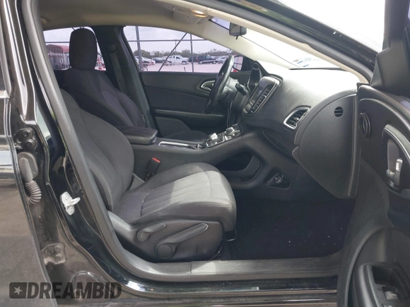 2015 Chrysler 200 Limited with VIN 1C3CCCAB2FN719935, listed as a IAAI auction lot 42191027 with 156,132 mi miles and . Bid and sale history available at DreamBid. Image 5.