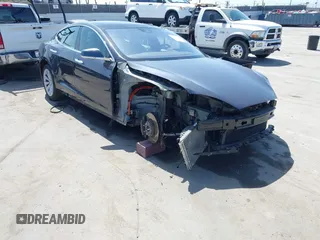 2016 Tesla Model S 90D with VIN 5YJSA1E22GF138236, listed as a IAAI auction lot 42532245 with 72,839 mi miles and . Bid and sale history available at DreamBid. Image 6.