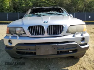 2001 BMW X5 4.4i with VIN WBAFB33581LH13564, listed as a Copart auction lot 74357004 with 0 mi miles and Salvage Title. Bid and sale history available at carsss.com. Image 5.