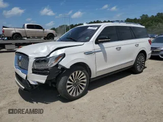 2019 Lincoln Navigator Reserve z VIN 5LMJJ2LT9KEL13923, wystawiony jako Copart lot #57125685 z przebiegiem 130 835 mil mil oraz Szkoda całkowita • Salvage title. Historia ofert i sprzedaży dostępna na DreamBid. Obrazek 1.