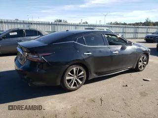 2019 Nissan Maxima SL с VIN 1N4AA6AV9KC370210, выставлен на аукционе Copart как лот 79647094 с пробегом 150 553 миль миль и Списание • Salvage title. История ставок и продаж доступна на DreamBid. Изображение 3.