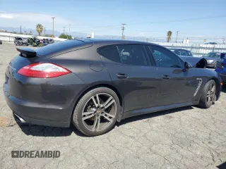 2013 Porsche Panamera с VIN WP0AA2A72DL014902, выставлен на аукционе Copart как лот 49202365 с пробегом 78 758 миль миль и Списание • Salvage title. История ставок и продаж доступна на DreamBid. Изображение 3.