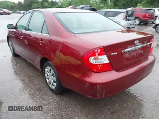 2003 Toyota Camry LE with VIN JTDBE32K630159278, listed as a IAAI auction lot 42148712 with 184,999 mi miles and . Bid and sale history available at DreamBid. Image 3.