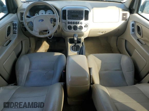 2007 Ford Escape Limited with VIN 1FMCU04177KA09776, listed as a Copart auction lot 60784535 with 175,679 mi miles and Salvage title. Bid and sale history available at DreamBid. Image 8.