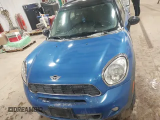 2013 MINI Countryman S ALL4 z VIN WMWZC5C59DWM16261, wystawiony jako IAAI lot #41563270 z przebiegiem 159 516 mil mil oraz . Historia ofert i sprzedaży dostępna na DreamBid. Obrazek 6.