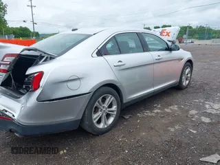 2015 Ford Taurus SEL with VIN 1FAHP2E91FG137696, listed as a IAAI auction lot 42168950 with 81,050 mi miles and . Bid and sale history available at DreamBid. Image 4.