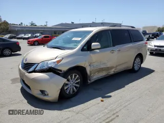 2014 Toyota Sienna LE with VIN 5TDJK3DC1ES091904, listed as a Copart auction lot 55905045 with 95,529 mi miles and Salvage title. Bid and sale history available at DreamBid. Image 1.