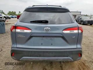 2023 Toyota Corolla Cross LE z VIN 7MUCAAAG4PV038470, wystawiony jako Copart lot #55999615 z przebiegiem 41 269 mil mil oraz Szkoda całkowita • Salvage title. Historia ofert i sprzedaży dostępna na DreamBid. Obrazek 6.