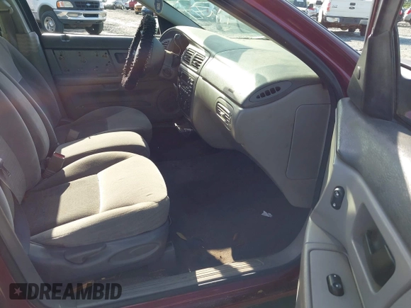2007 Ford Taurus SE z VIN 1FAFP53U97A216487, wystawiony jako IAAI lot #42322956 z przebiegiem 169 743 mil mil oraz . Historia ofert i sprzedaży dostępna na DreamBid. Obrazek 5.