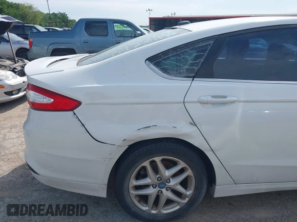 2013 Ford Fusion SE with VIN 3FA6P0H70DR249305, listed as a IAAI auction lot 42194528 with 122,810 mi miles and . Bid and sale history available at carsss.com. Image 13.