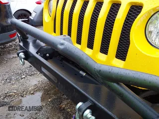2019 Jeep Wrangler Unlimited Sport S with VIN 1C4HJXDG4KW579364, listed as a IAAI auction lot 41809318 with 22,370 mi miles and . Bid and sale history available at DreamBid. Image 17.