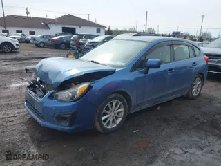 2014 Subaru Impreza Wagon 2.0i Premium with VIN JF1GPAC65E8261560, listed as a IAAI auction lot 41777852 with 145,880 mi miles. Bid and sale history available at carsss.com. Image 2.