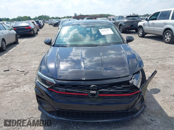 2019 Volkswagen Jetta GLI S with VIN 3VW5T7BU9KM142379, listed as a IAAI auction lot 42056617 with 77,283 mi miles and . Bid and sale history available at DreamBid. Image 12.