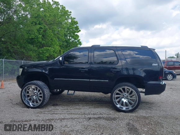 2007 Chevrolet Tahoe LT z VIN 1GNFK13067R331734, wystawiony jako IAAI lot #42372797 z przebiegiem 173 150 mil mil oraz . Historia ofert i sprzedaży dostępna na DreamBid. Obrazek 14.