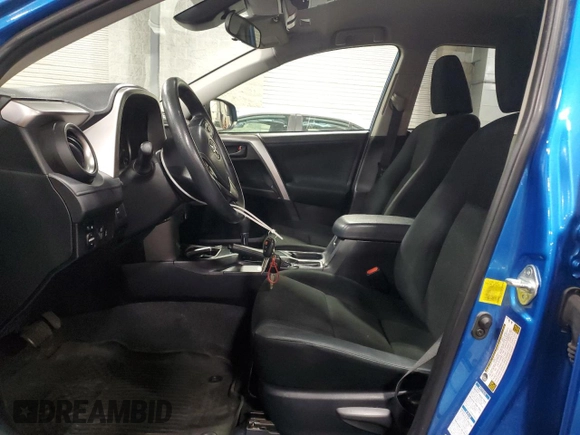 2017 Toyota RAV4 LE with VIN JTMBFREV8HJ141257, listed as a Copart auction lot 54527785 with 125,423 mi miles and Salvage Title. Bid and sale history available at DreamBid. Image 7.
