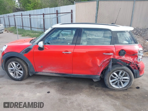 2012 MINI Countryman S with VIN WMWZC5C54CWM13041, listed as a IAAI auction lot 42244303 with 139,733 mi miles and . Bid and sale history available at DreamBid. Image 14.