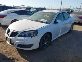 2010 Pontiac G6 w/1SB with VIN 1G2ZA5EB2A4103396, listed as a IAAI auction lot 42014797 with 1 mi miles. Bid and sale history available at carsss.com. Image 2.