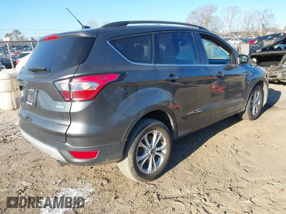 2018 Ford Escape SE with VIN 1FMCU0GD0JUA87303, listed as a IAAI auction lot 41612502 with 70,233 mi miles. Bid and sale history available at carsss.com. Image 4.