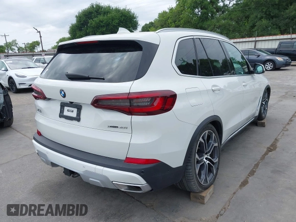 2023 BMW X5 xDrive40i with VIN 5UXCR6C04P9P15756, listed as a IAAI auction lot 42030023 with 40,280 mi miles and . Bid and sale history available at DreamBid. Image 4.