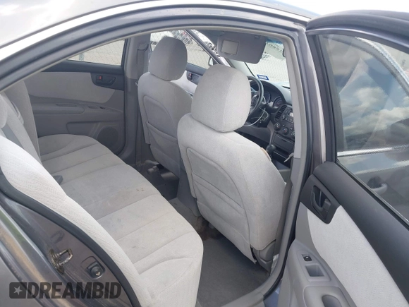 2007 Kia Optima LX z VIN KNAGE123375110290, wystawiony jako IAAI lot #42586225 z przebiegiem 49 928 mil mil oraz . Historia ofert i sprzedaży dostępna na DreamBid. Obrazek 8.