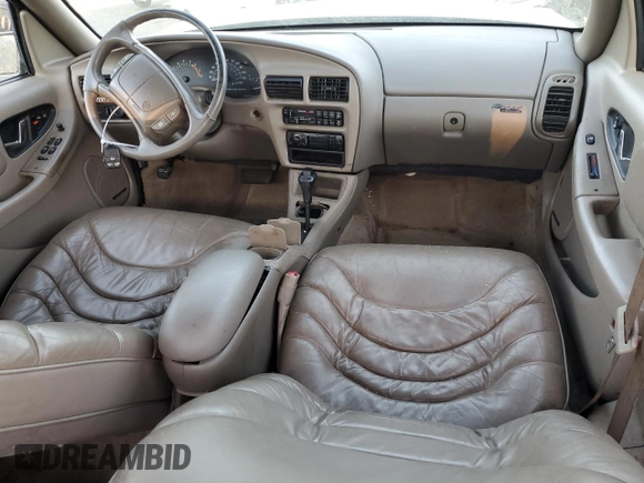 1996 Buick Regal Custom with VIN 2G4WB52K5T1517380, listed as a Copart auction lot 83106314 with 112,411 mi miles and Salvage title. Bid and sale history available at DreamBid. Image 8.