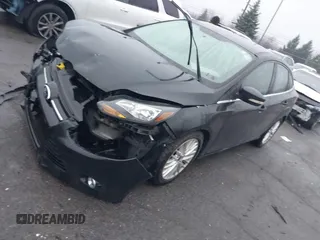 2014 Ford Focus Titanium with VIN 1FADP3J24EL439065, listed as a IAAI auction lot 40868973 with 167,739 mi miles. Bid and sale history available at carsss.com. Image 17.