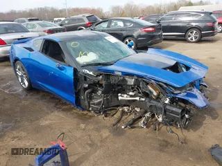 2014 Chevrolet Corvette Z51 3LT z VIN 1G1YM2D77E5120729, wystawiony jako IAAI lot #41821347 z przebiegiem 19 747 mil mil oraz . Historia ofert i sprzedaży dostępna na DreamBid. Obrazek 1.