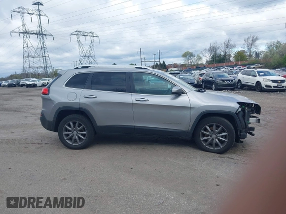 2015 Jeep Cherokee Limited with VIN 1C4PJMDS4FW650454, listed as a IAAI auction lot 42044380 with 123,837 mi miles. Bid and sale history available at carsss.com. Image 14.