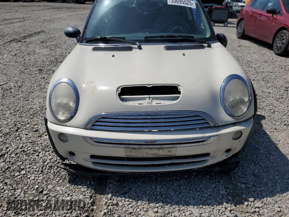 2006 MINI Hardtop with VIN WMWRC33586TJ77908, listed as a Copart auction lot 55095525 with 143,810 mi miles and Salvage title. Bid and sale history available at DreamBid. Image 11.